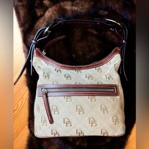 Vintage Dooney & Bourke Tan canvas shoulder bag.